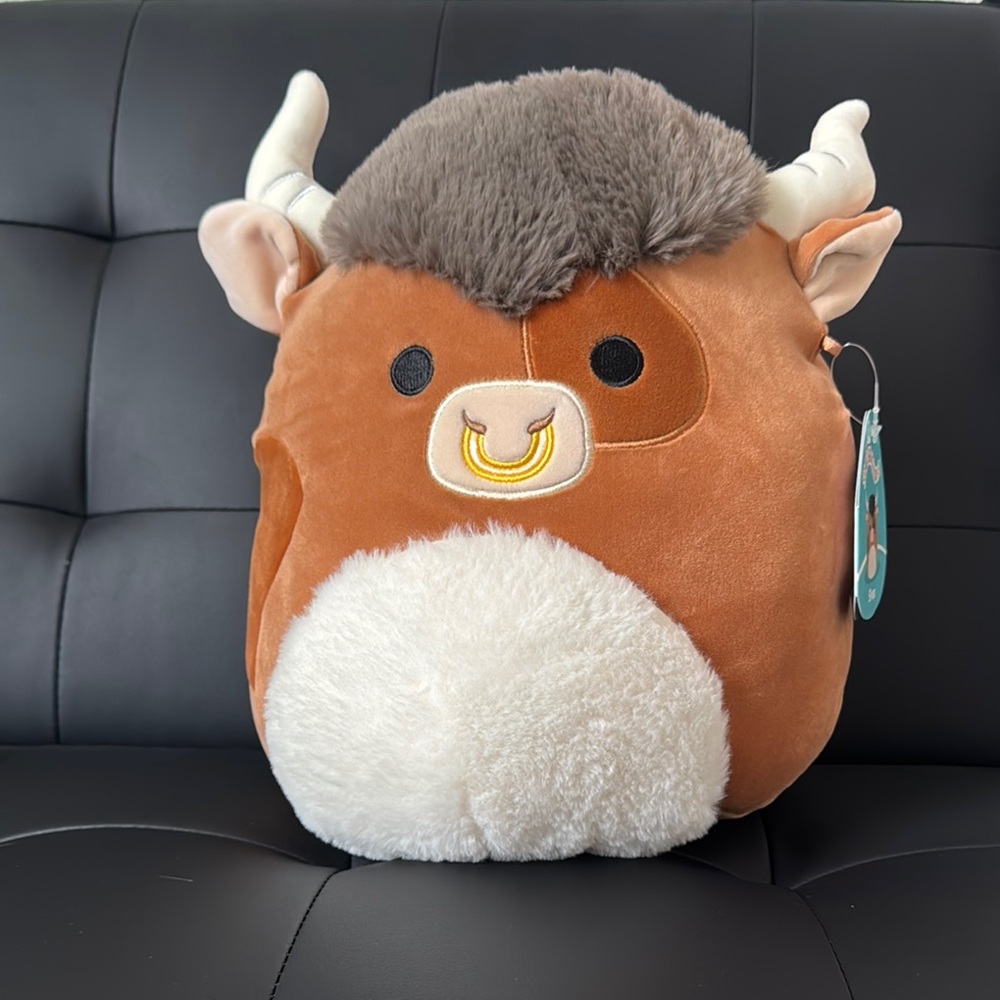 Brown and White Plush Bull Toy